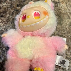 The Monsters Pink and White Plush Creature
